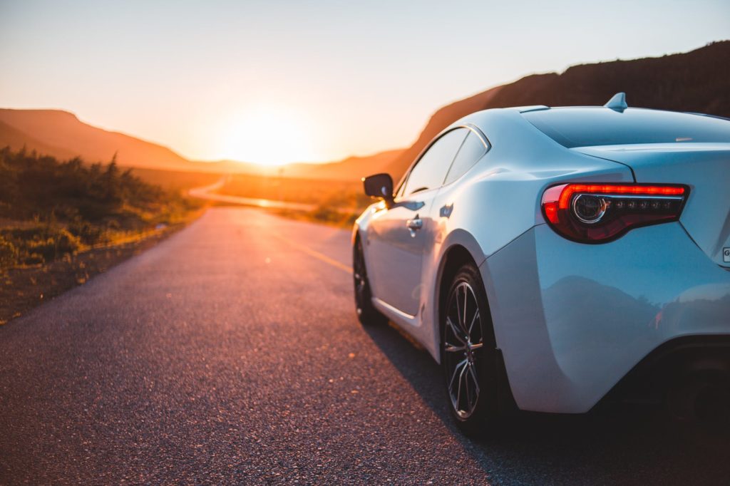 Car on hot summer road